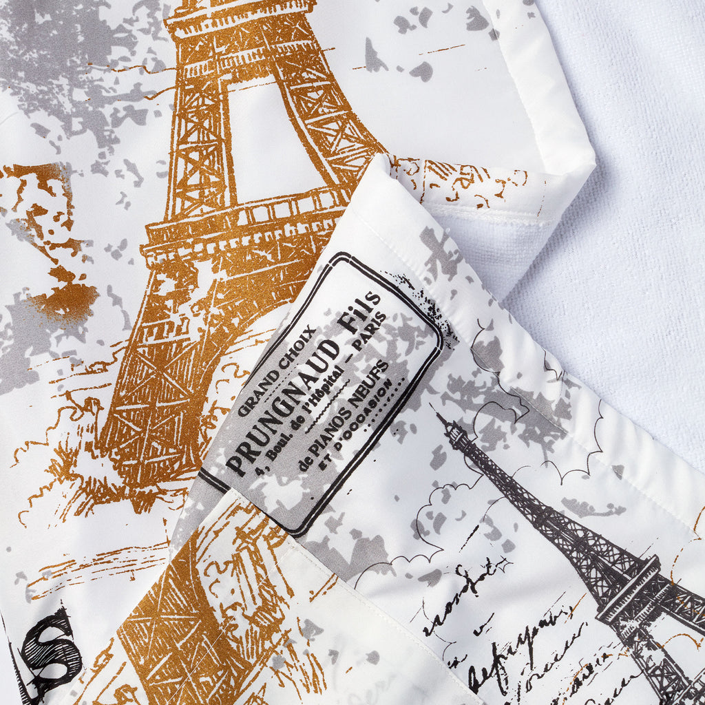 Welcome to chic comfort! Enjoy your me time wrapped up in Parisian style. Featuring an all-over romantic vintage print of the Eiffel tower and French phrases, the Paris Robe lets you wind down and relax.   SOFT POLY- Lined with terrycloth for extra comfort. ICONIC PARIS PRINT - Feel like you're in the cosmopolitan capital of the world.
