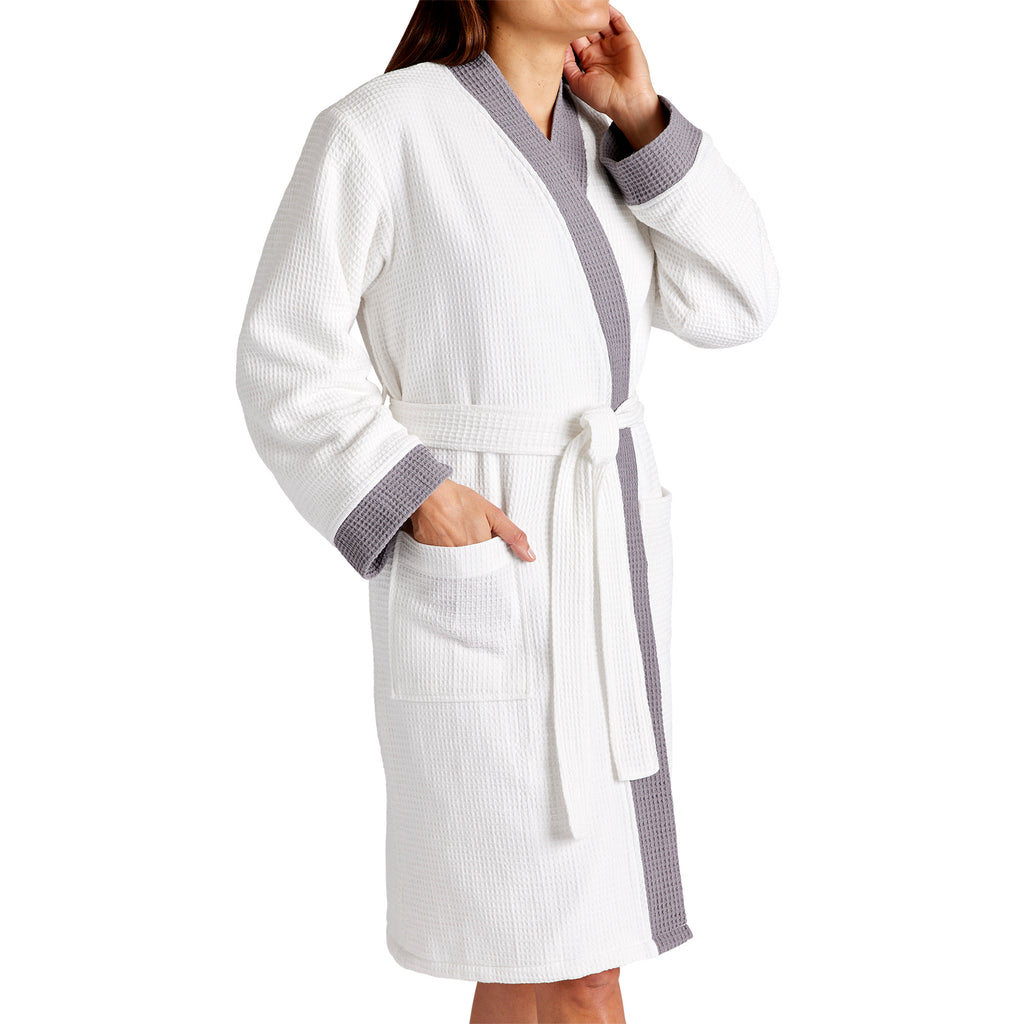 Slip on this responsibly sourced, eco-friendly, expertly constructed robe. The textured fabric provides great absorption and smoothness on your skin. In a fresh poly-cotton blend that's free of harmful chemicals and will naturally become softer with every machine wash.   SOFT POLY - Waffled textured plush makes for the smoothest material. WRAPAROUND BELT - Easy to slip On, with adjustable belt lets you cinch into the right fit for the most comfort.