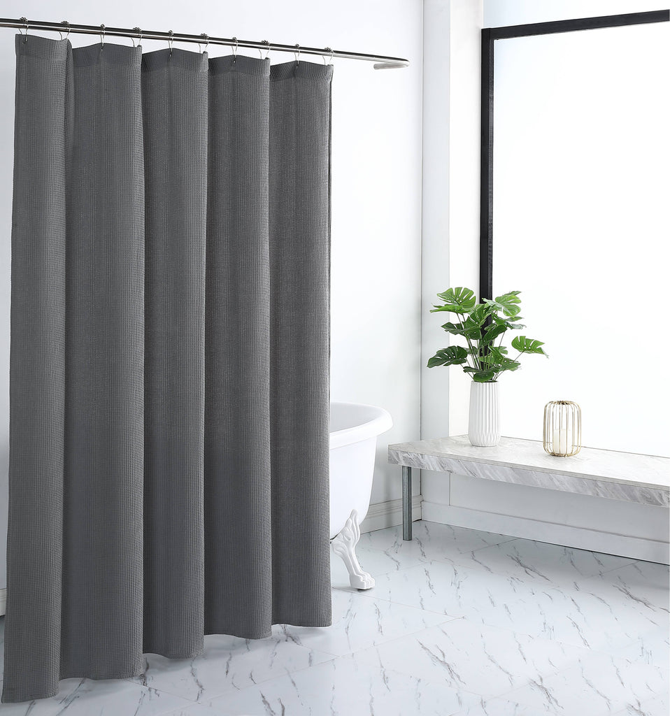 Responsibly sourced, environmentally conscious, chemical-free. It's easy to add a breath of fresh air to your bathroom with the subtle pattern and pleasing texture of this shower curtain. In a lightweight yet durable cotton-poly blend in bright white and classic gray.  CLASSIC DESIGN - Allover waffle weave. SOFT FABRIC - Breathable, quick-drying, wrinkle-free. 