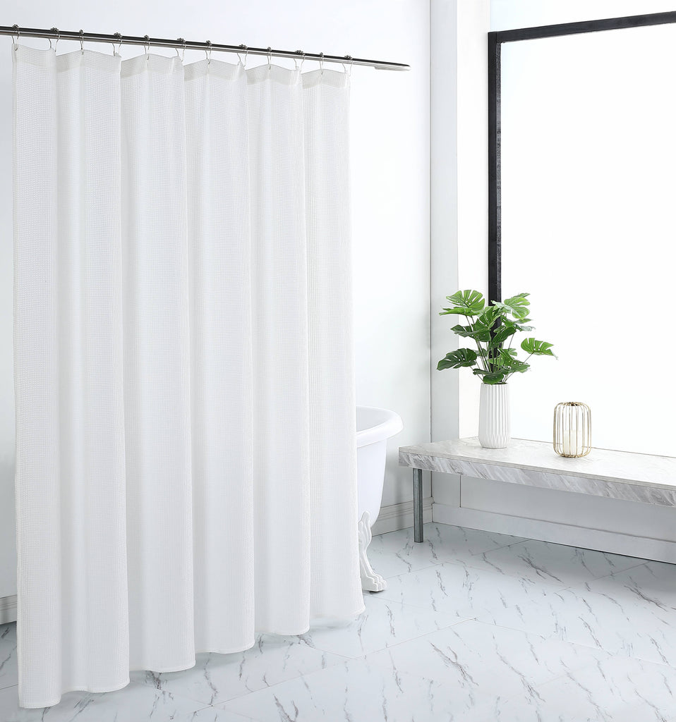 Responsibly sourced, environmentally conscious, chemical-free. It's easy to add a breath of fresh air to your bathroom with the subtle pattern and pleasing texture of this shower curtain. In a lightweight yet durable cotton-poly blend in bright white and classic gray.  CLASSIC DESIGN - Allover waffle weave. SOFT FABRIC - Breathable, quick-drying, wrinkle-free. 
